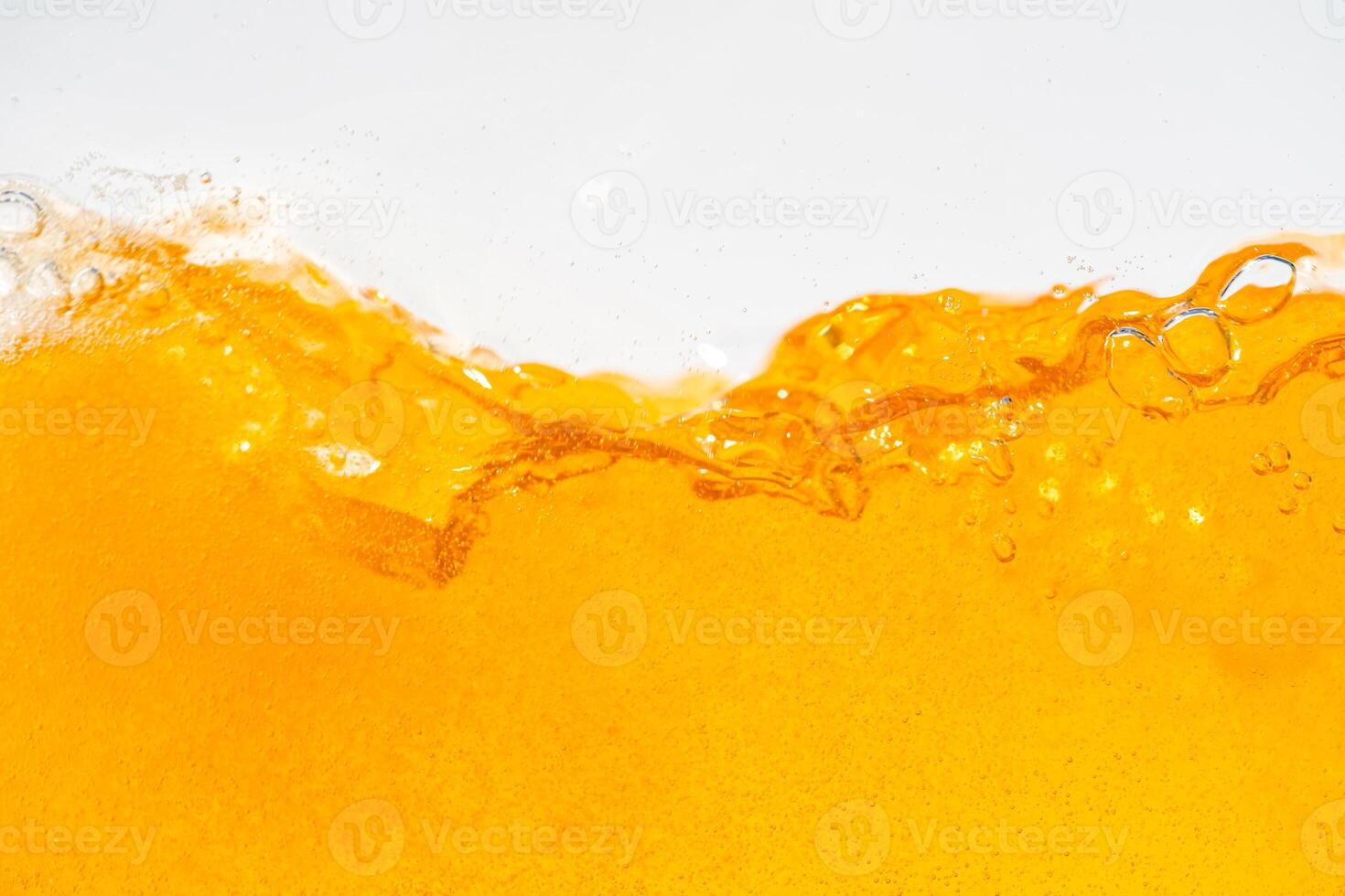 Close up bright orange Oil or beer splash texture and nature waves, Beautiful waves curve and little bubbles smooth for graphic design and background, Oil Bubbles, Soft beer bubbles, Selecti photo
