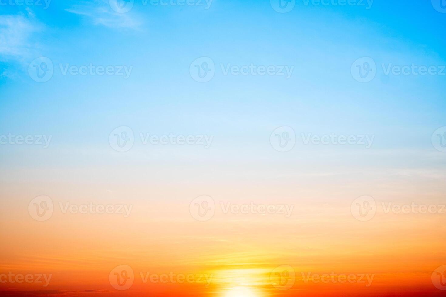 Sky,sunset, beautiful , luxury soft gradient orange gold clouds and sunlight on the blue sky perfect for the background, Sunrise on morning or evening in winter photo