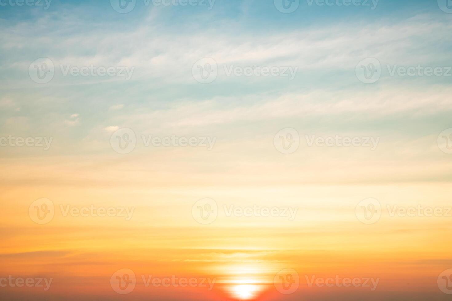 Beautiful , luxury soft gradient orange gold clouds and sunlight on the blue sky perfect for the background, take in evening,Twilight, Large size, high definition landscape pho photo