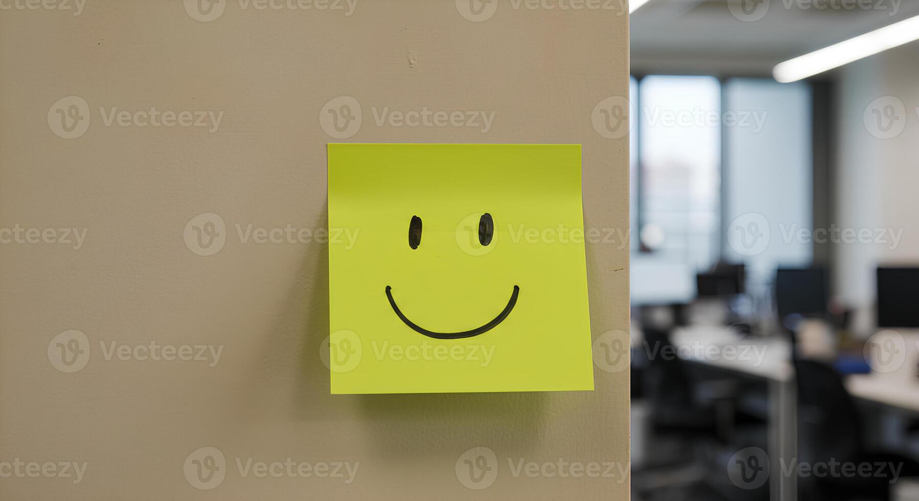 Hand-Drawn Smiley Face on a Bright Yellow Sticky Note for Mental Health Day. A simple yet powerful symbol of happiness and emotional wellness photo