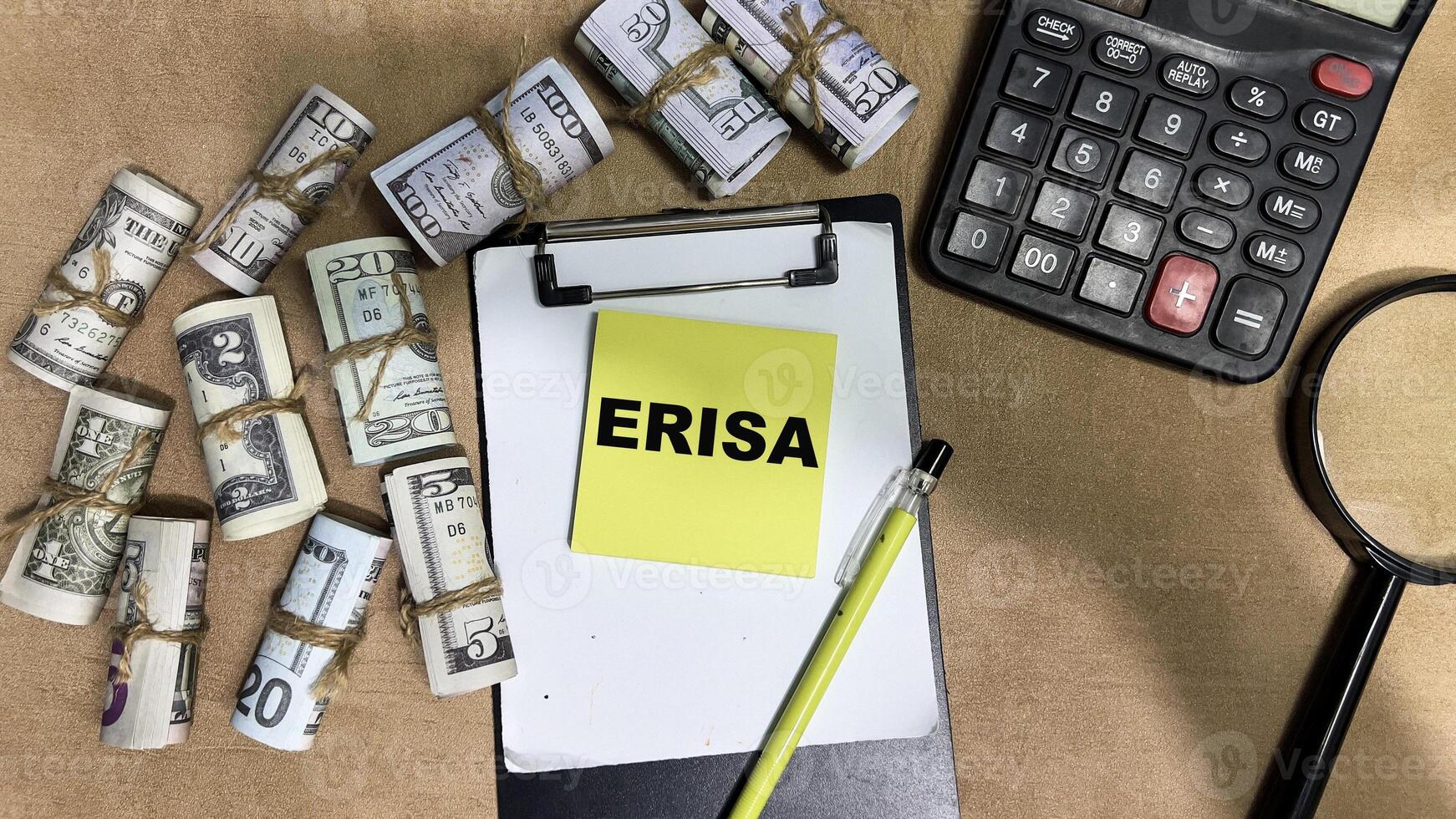 Concept of Erisa write on sticky notes isolated on Wooden Table photo
