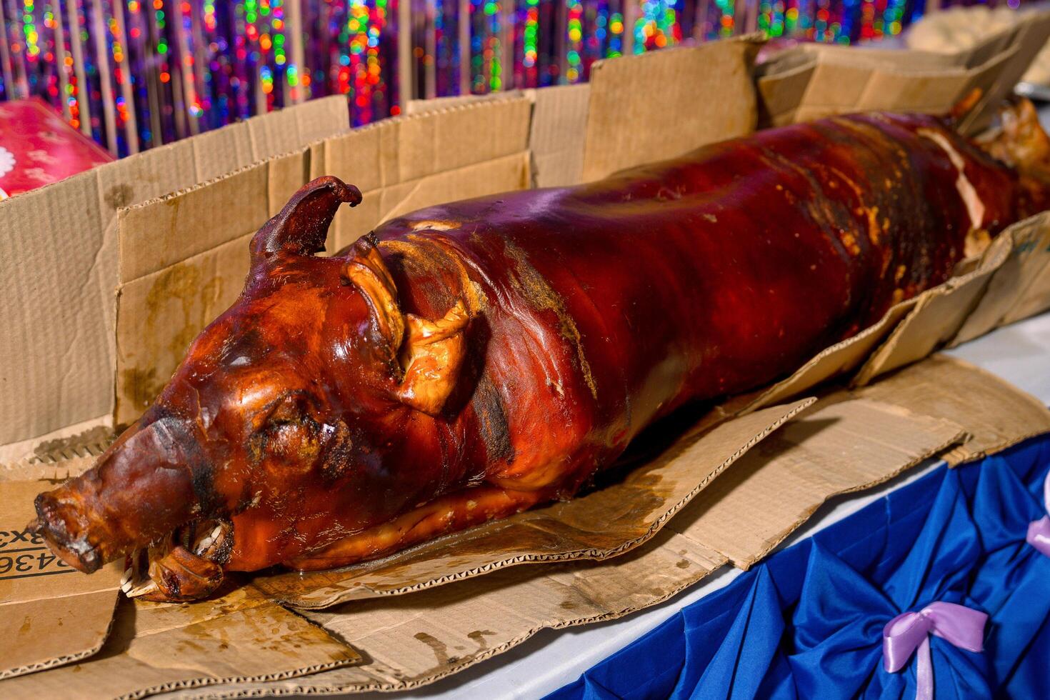 whole pork lechon served during a fiesta photo