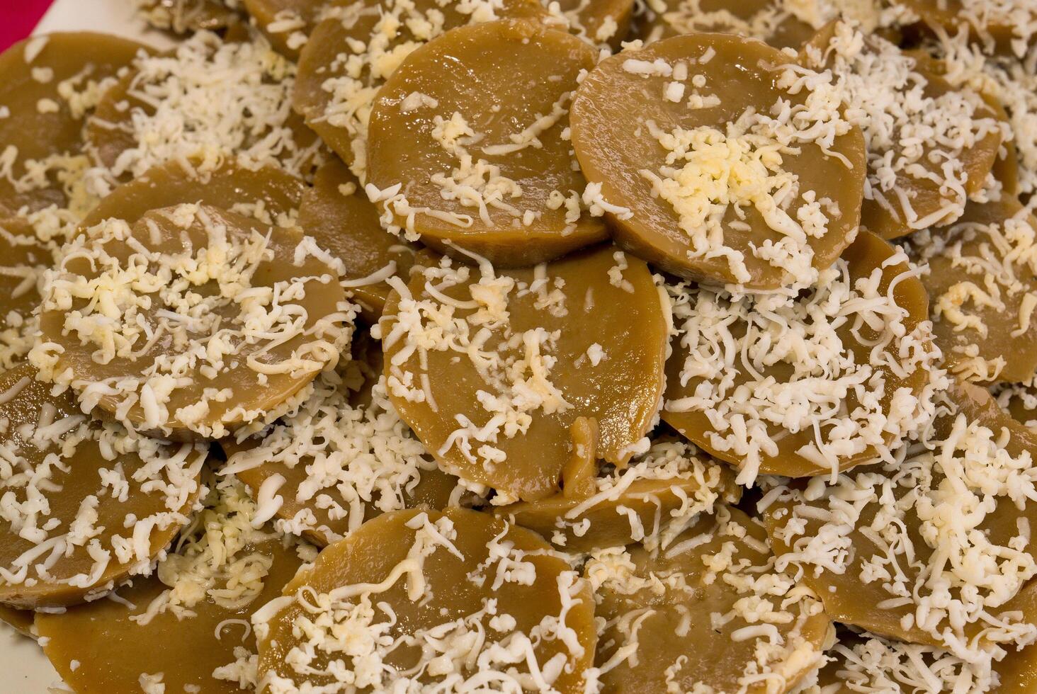 brown kutsinta with shaved coconut toppings photo