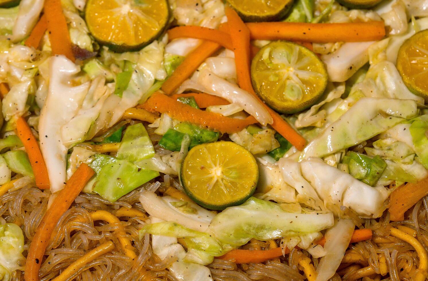 pancit canton guisado with calamansi photo