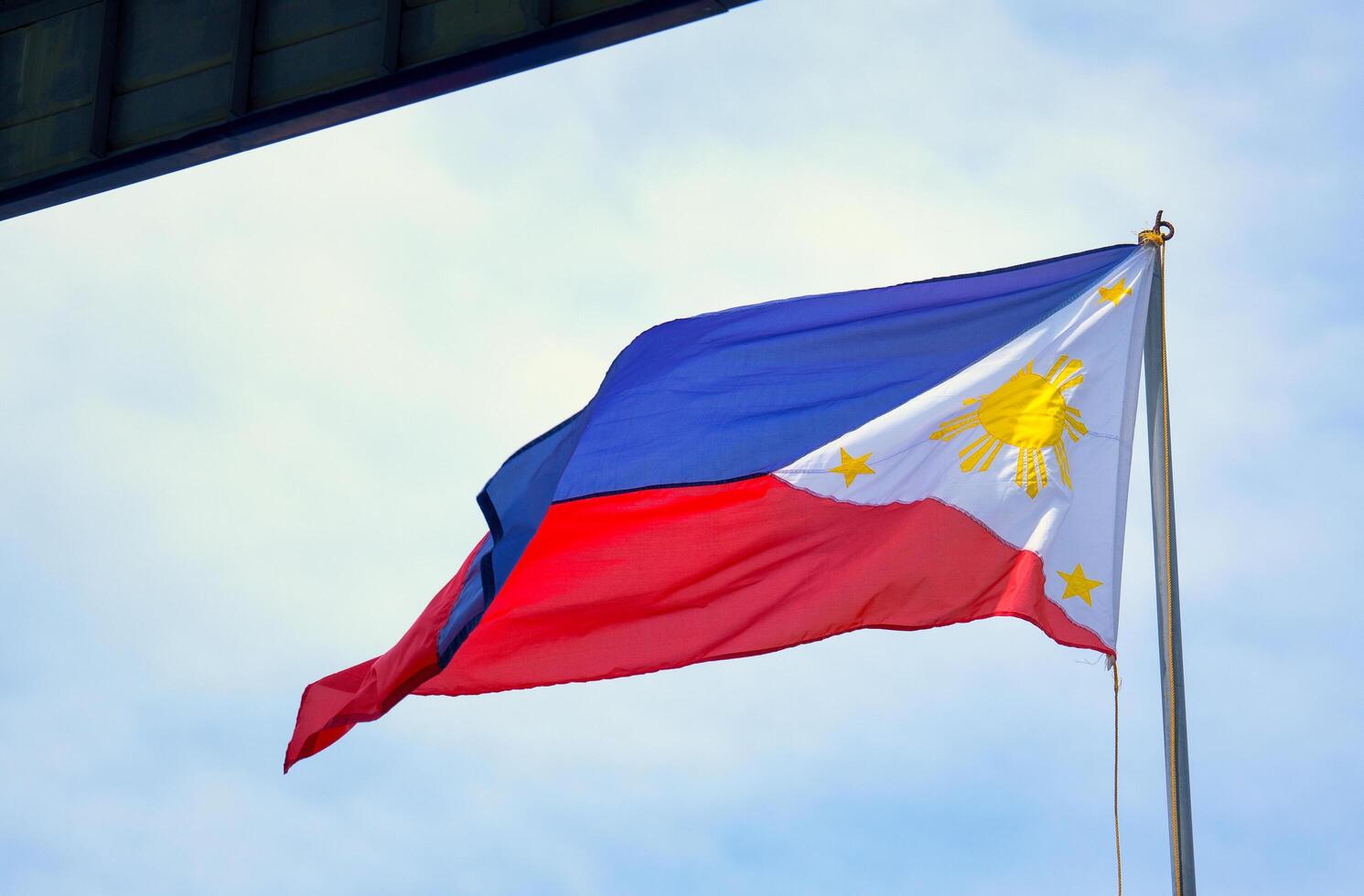 flag of the philippines swayed by the wind photo