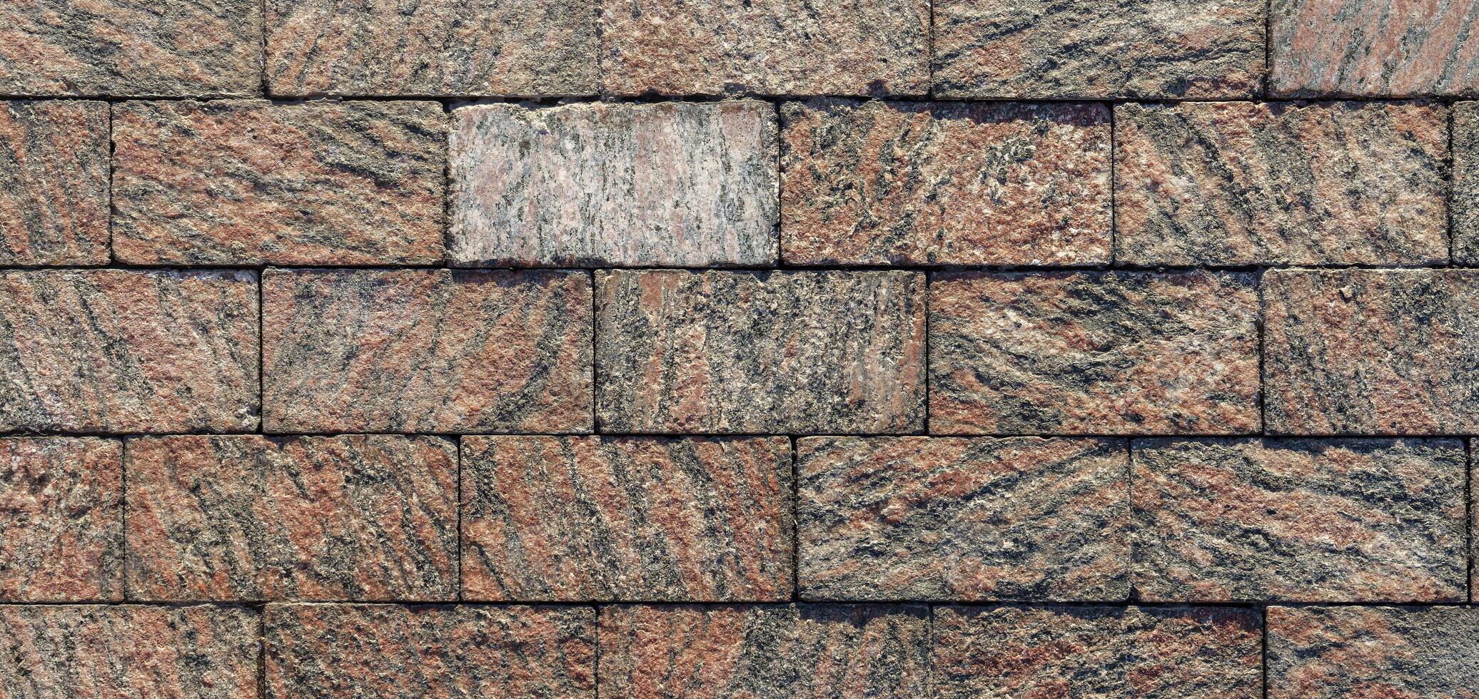 A close up of a brick roof with a square pattern photo