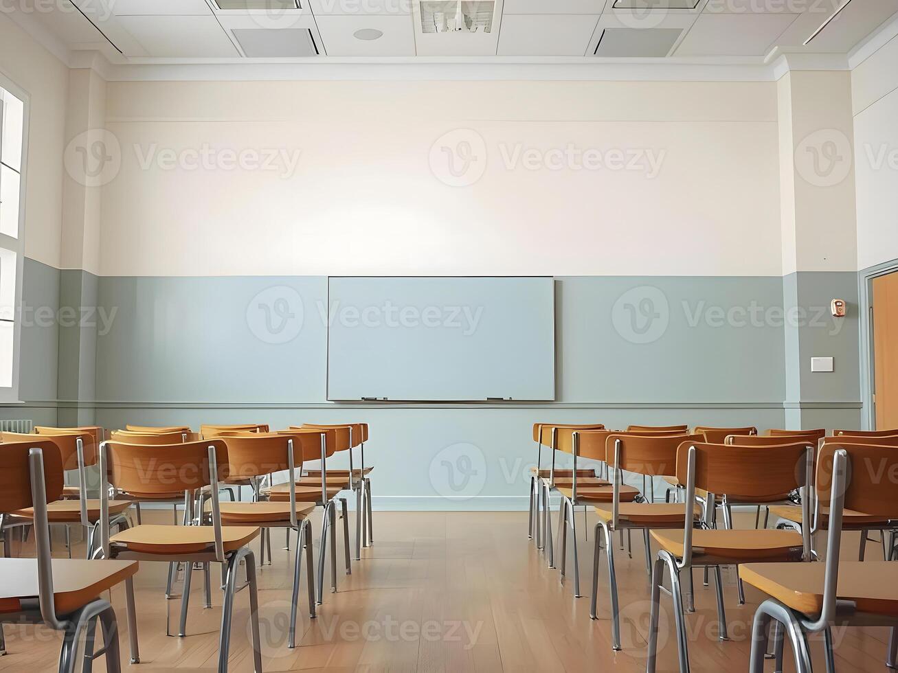 Empty classroom with wooden chairs and a white board photo