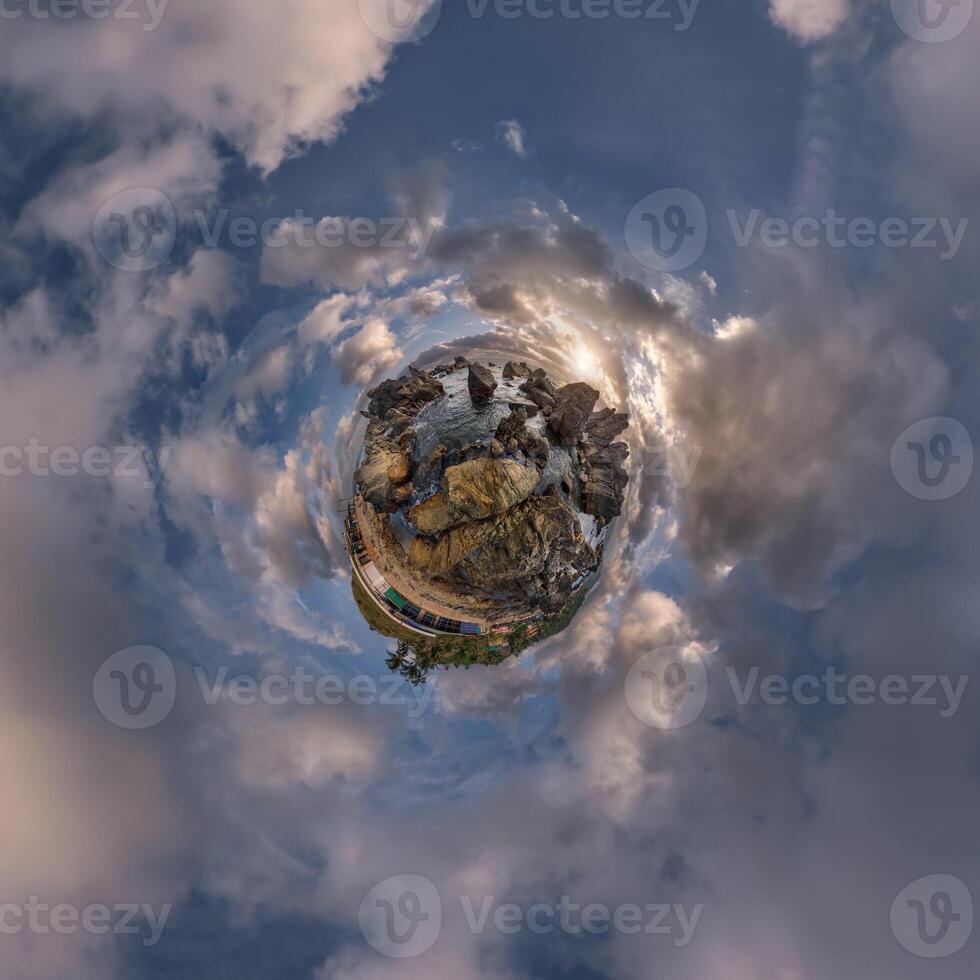 A small planet with clouds and a building in the sky photo