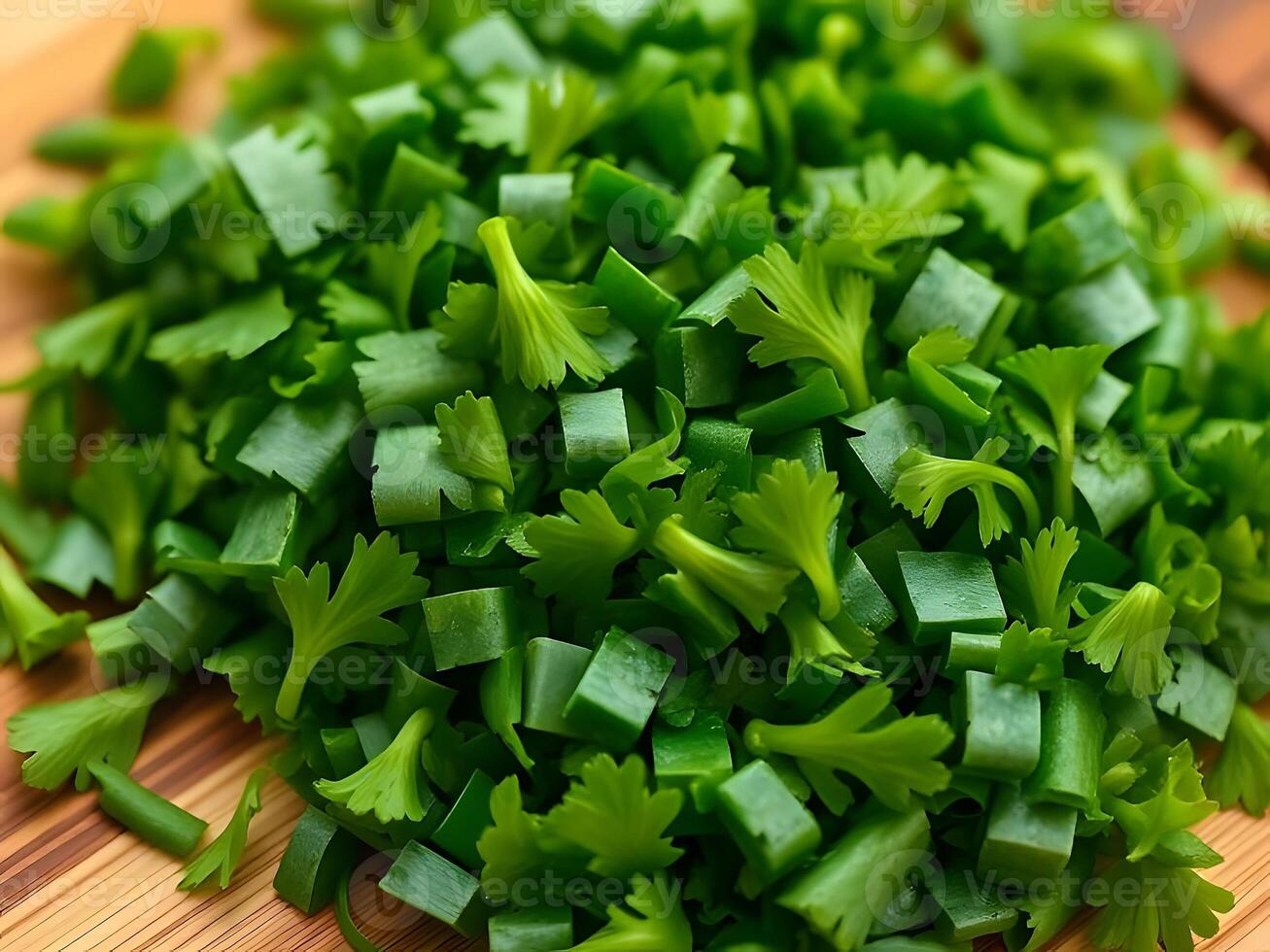 A pile of chopped green onions on a cutting board photo