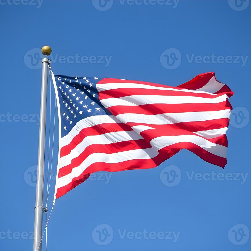 An american flag blowing in the wind photo