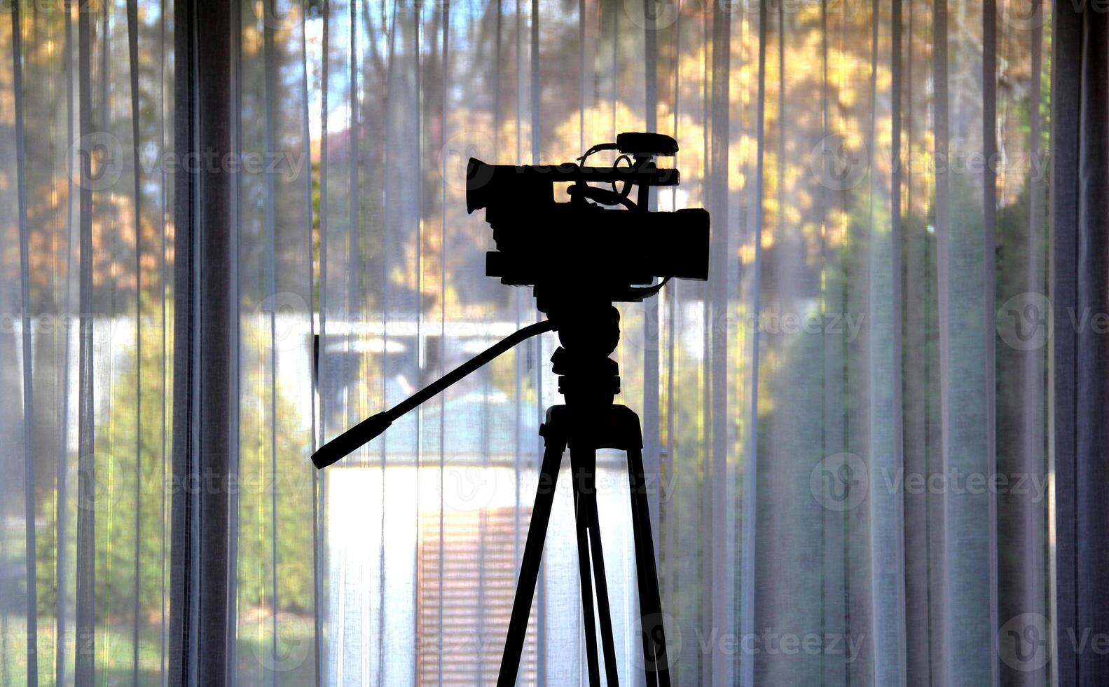 Camcorder On A Tripod With Wireless Microphone System photo