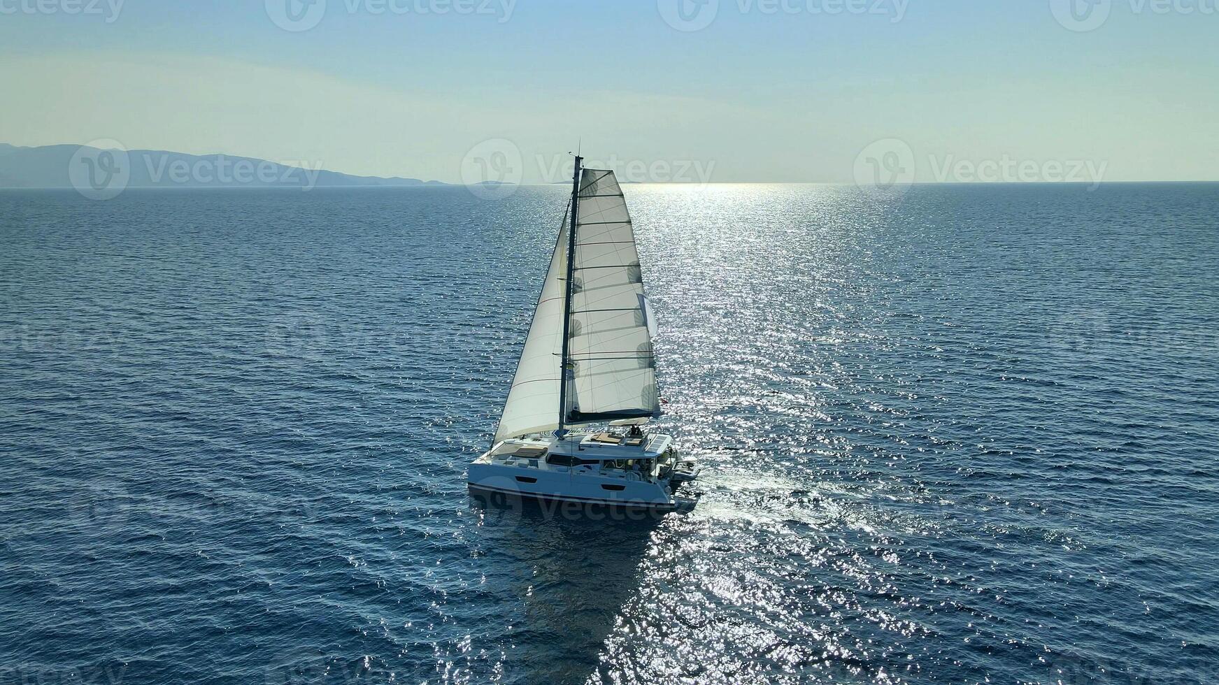 Sail Catamaran Floating At Calm Sea Aerial Photo