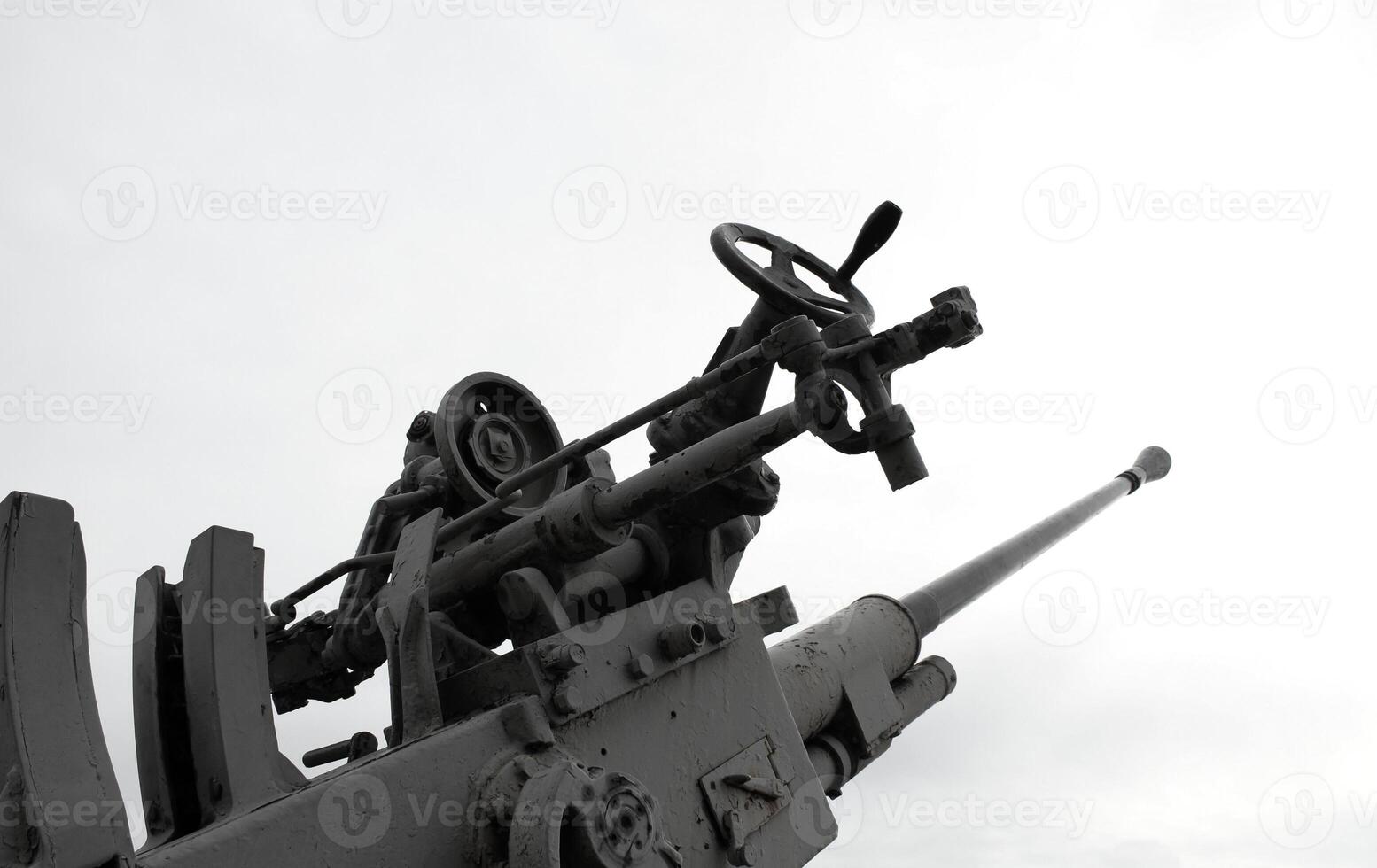 Old Large-Caliber Ship Gun Isolated On White photo