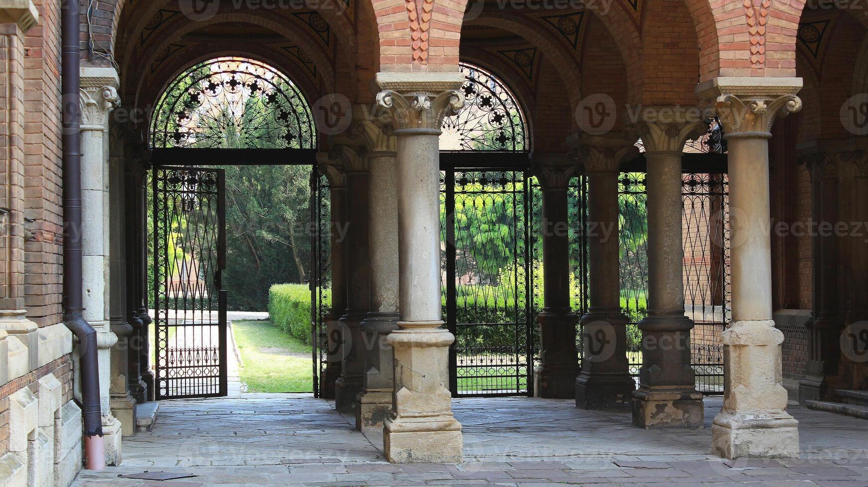 Columns Supporting Brick Vaults In Patio Of Ancient Castle photo