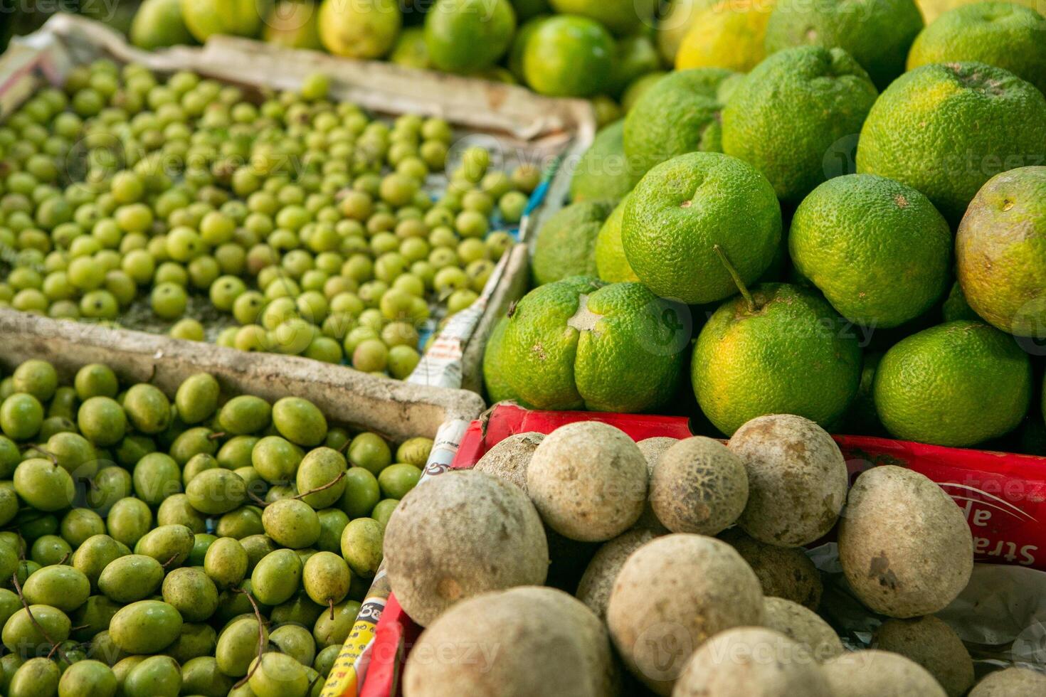 limes and other exotic fruits in sri lanka, asia photo