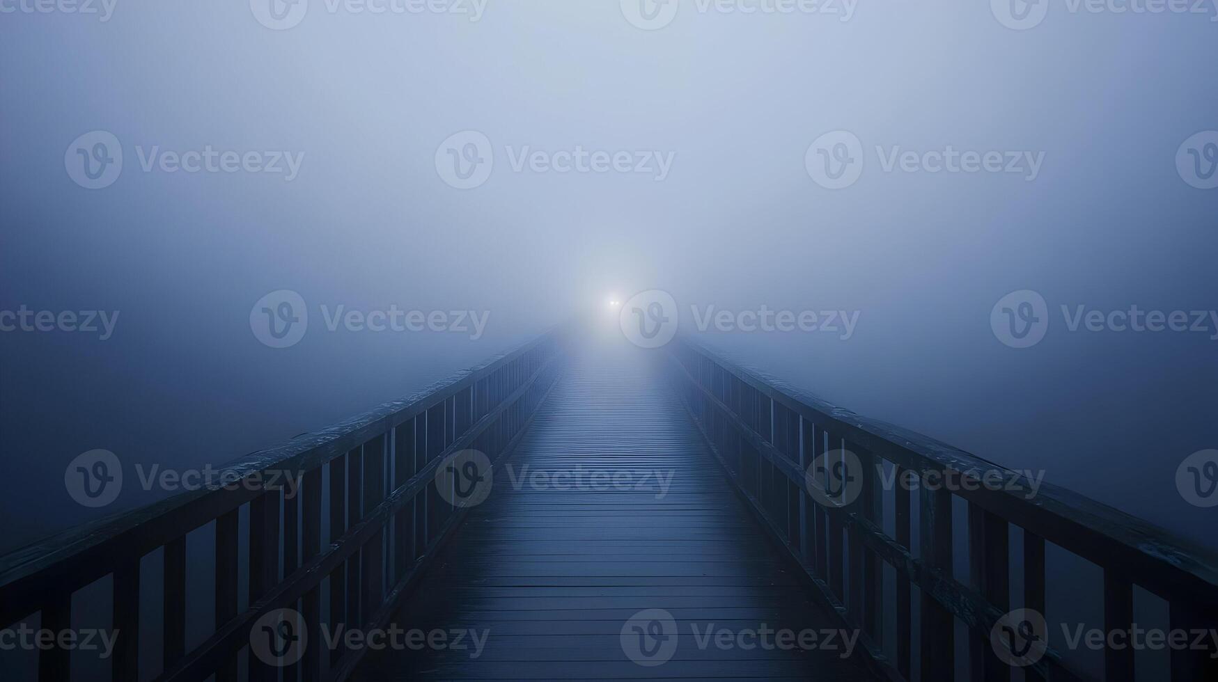 A serene perspective wooden pathway disappearing into a dense ethereal fog landscape photo