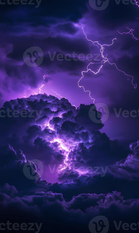 Dramatic indigo sky with vivid streaks of lightning and intense storm clouds display photo
