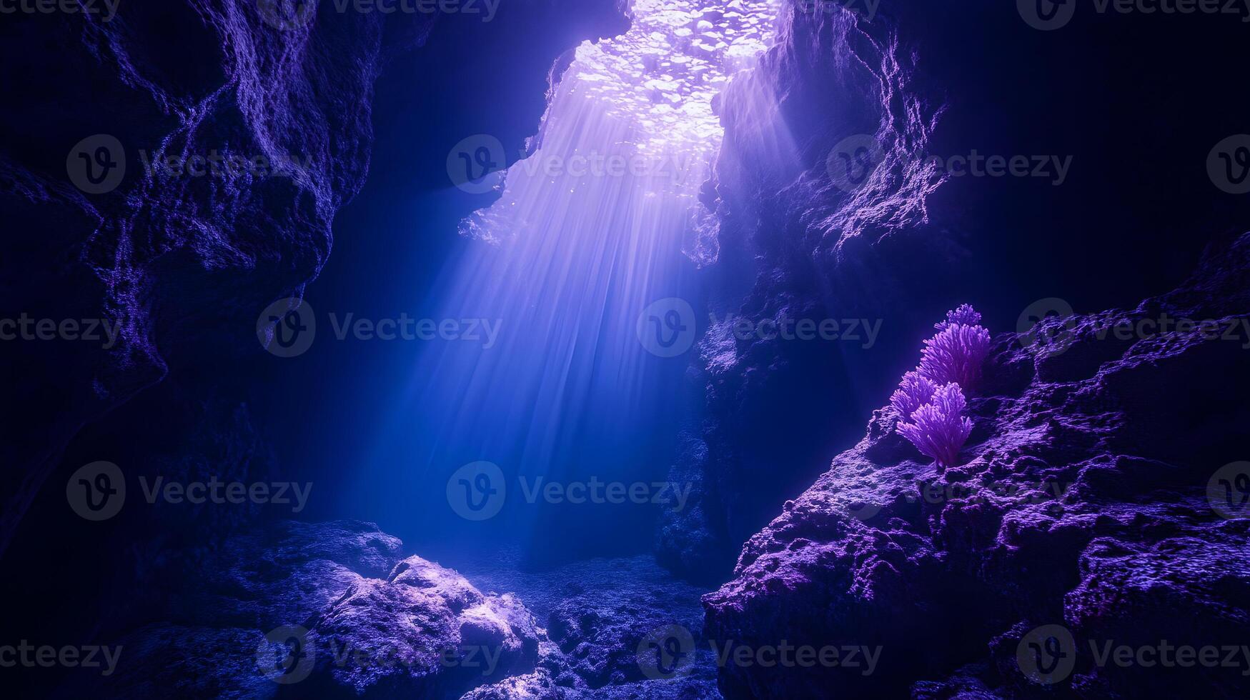 Submerged cavern graced by ethereal sunbeams filtering through crystalline waters photo