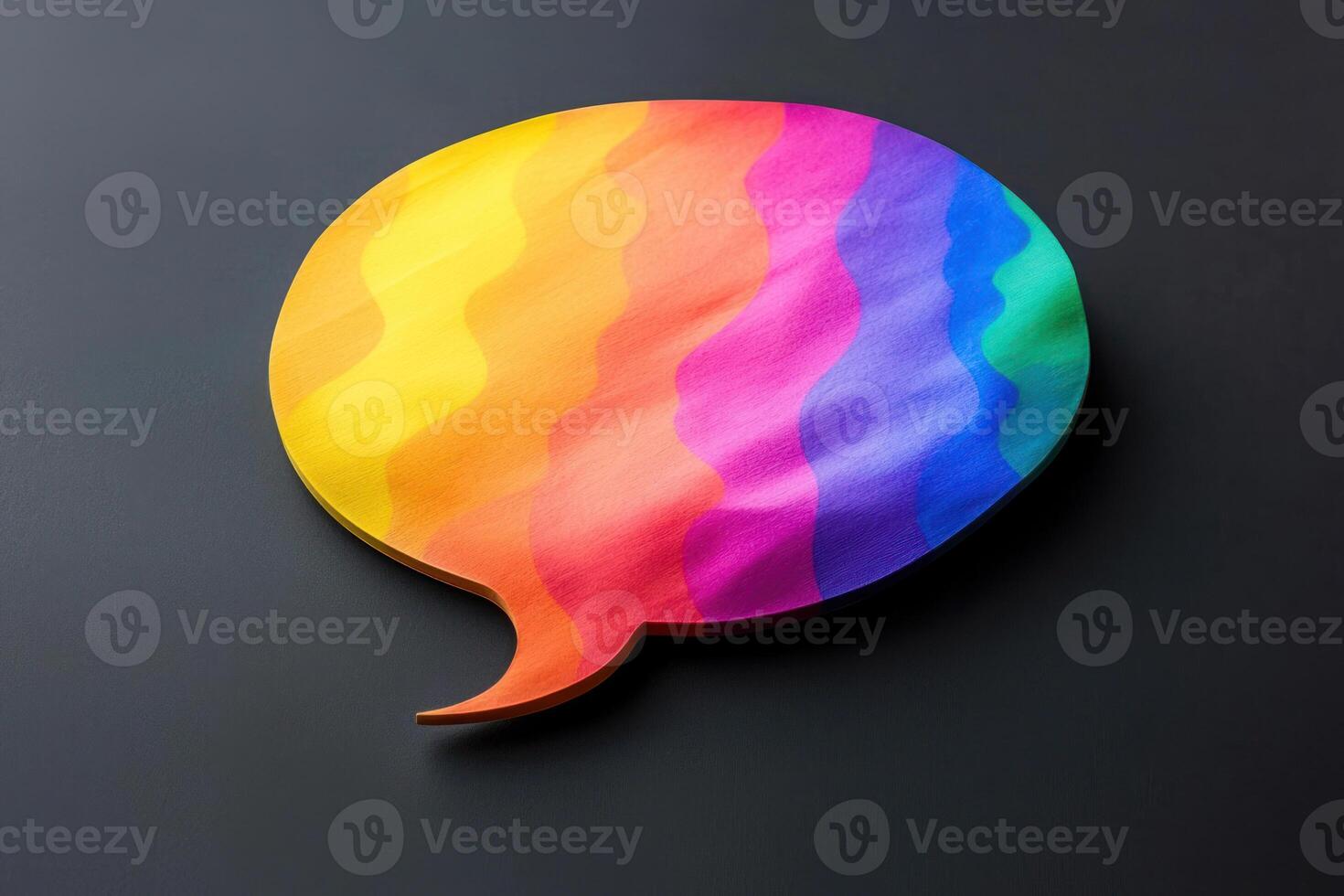 Rainbow colored speech bubble promoting dialogue and awareness for rights activism during pride month, with ample copy space photo