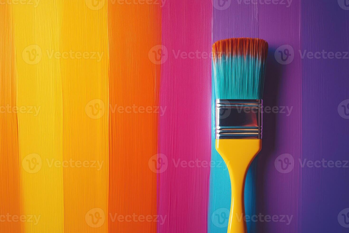 Colorful paintbrush against vibrant stripes of paint, evoking creativity and joy photo