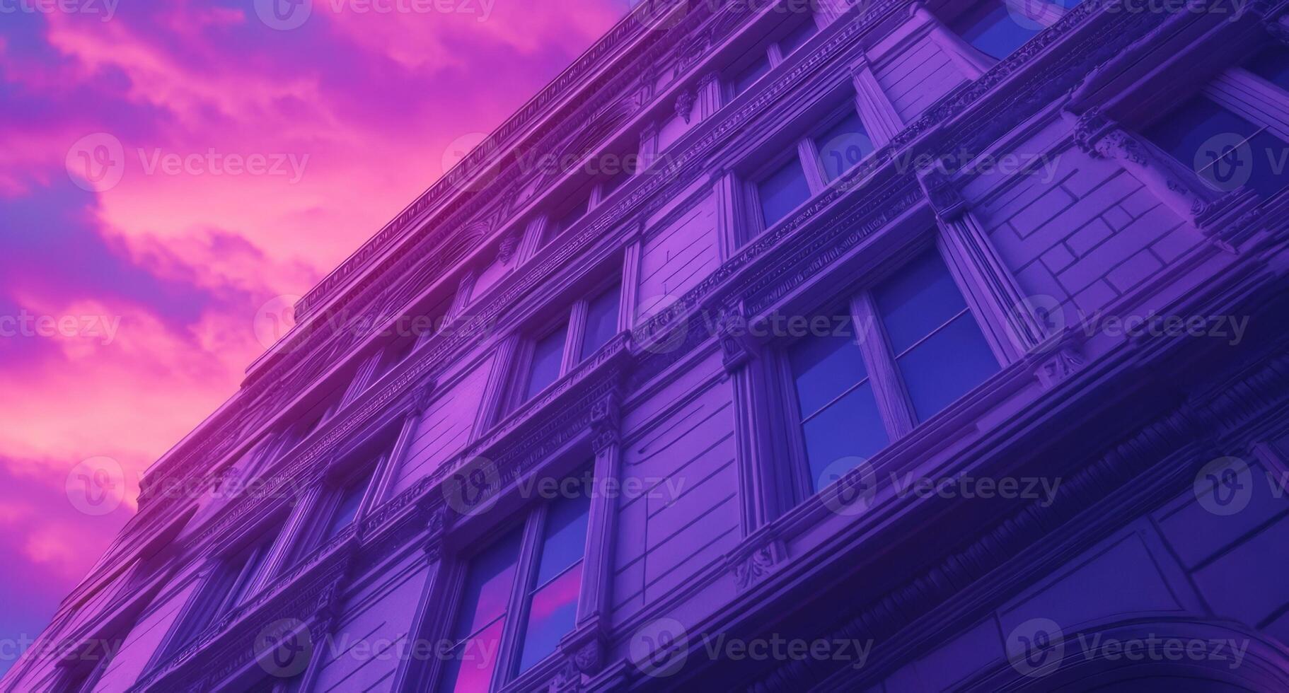 A purple sky with clouds and a building in the background photo