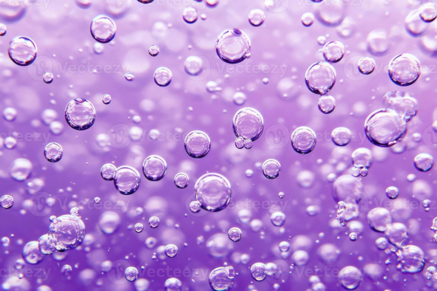 Water bubbles on a purple background photo