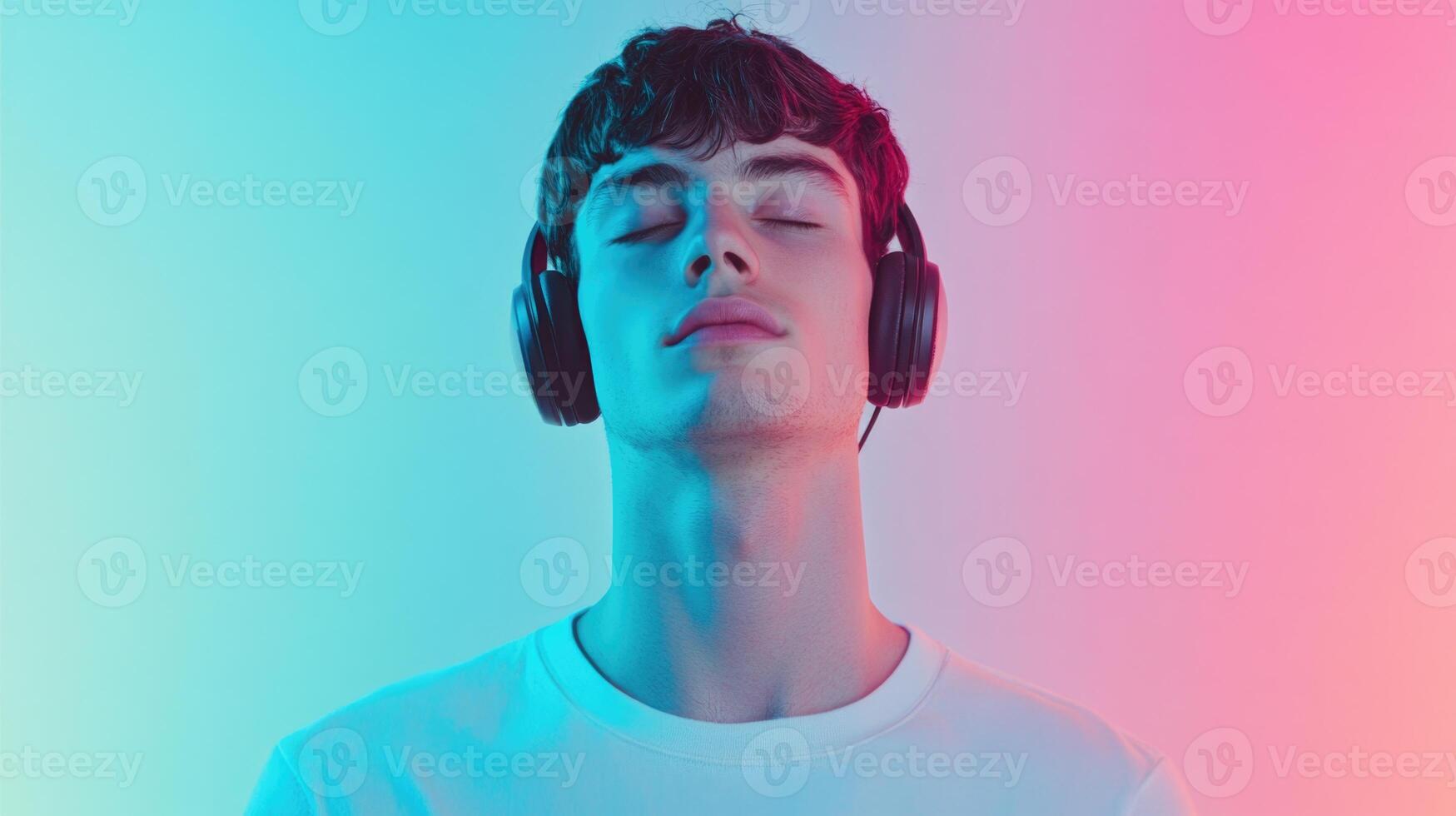 A man with headphones on his head photo