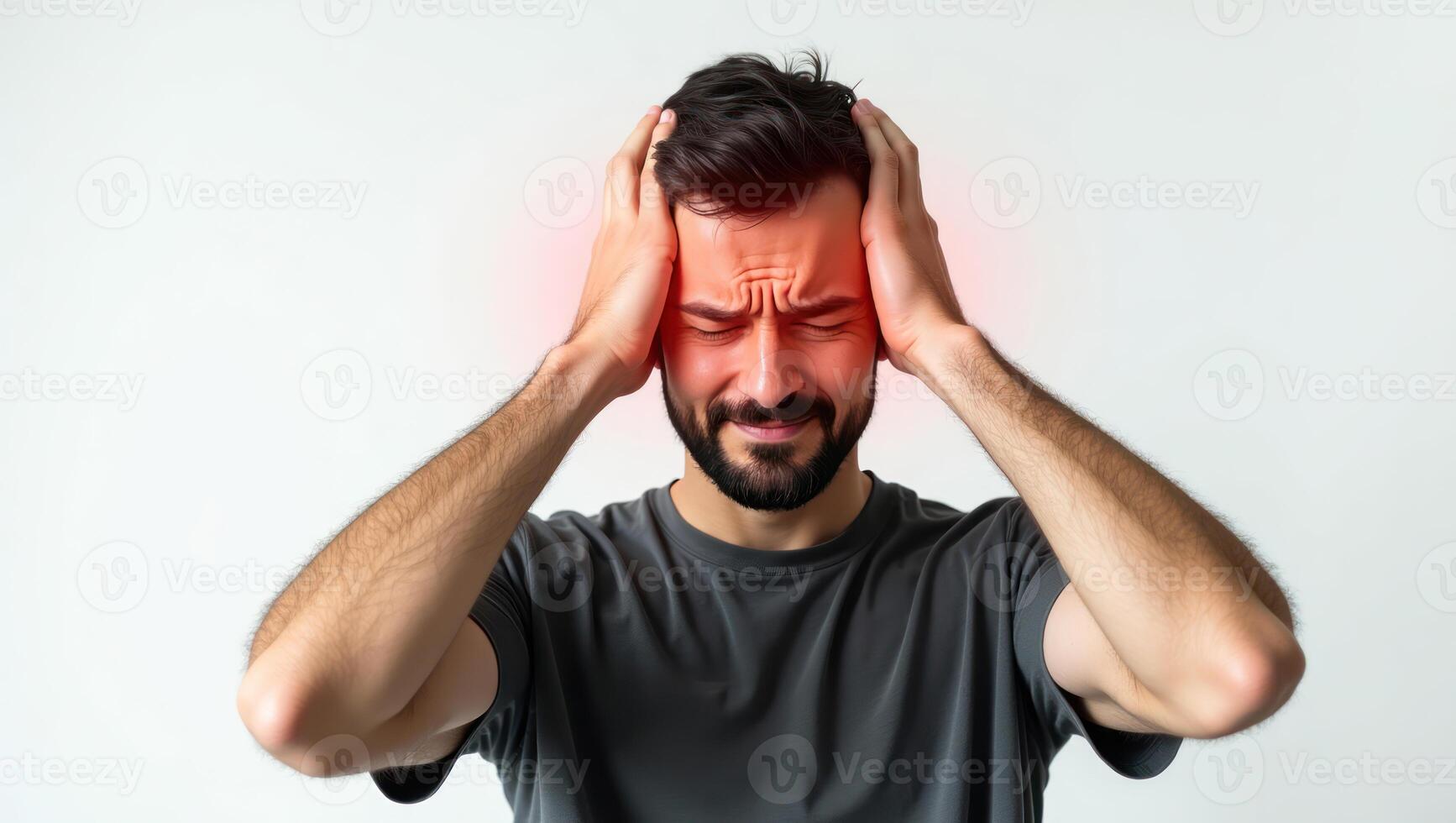 A man experiencing severe head pain with a red highlight on the affected area. photo
