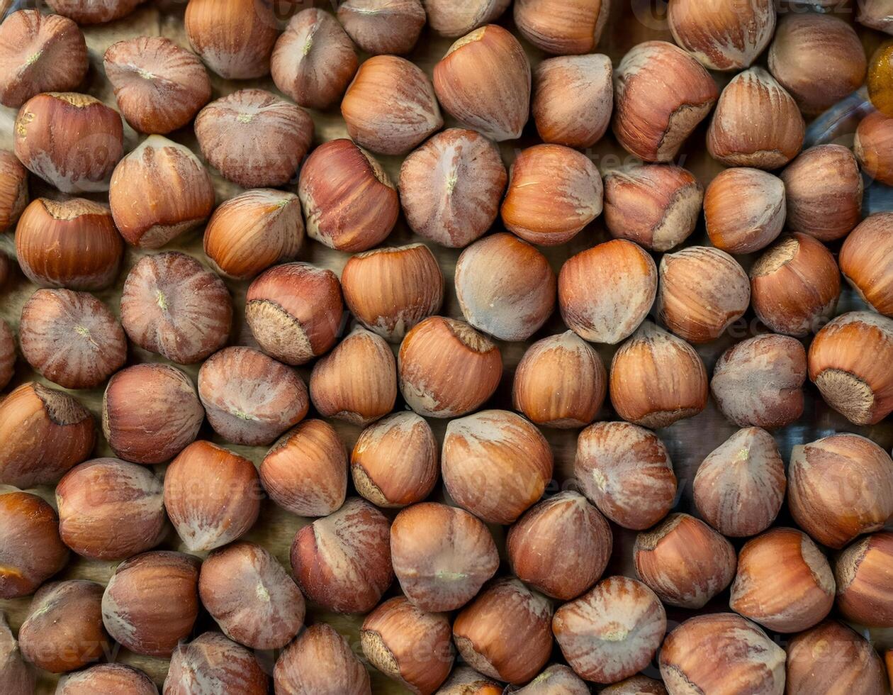 Close-up of Hazelnuts with Natural Texture, Perfect for Backgrounds photo