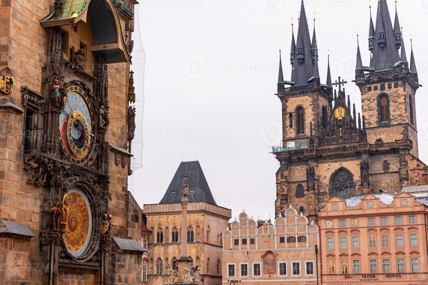 Prague astronomical clock and Church of Our Lady before Tyn showing amazing architecture photo