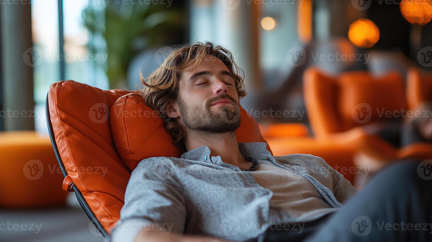 A Professional's Moment of Relaxation in a Stylish Office, A professional enjoying a moment of relaxation in a well-designed office space photo