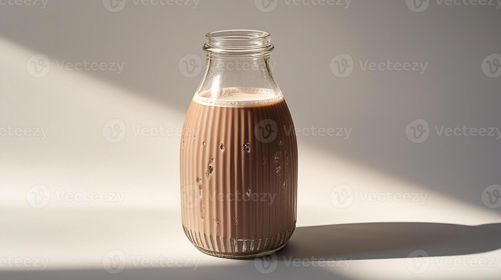 Chocolate milk in vintage glass bottle photo
