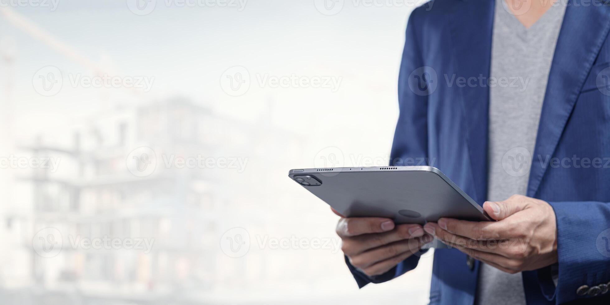 Modern Technology in Construction Business with Tablet Device photo