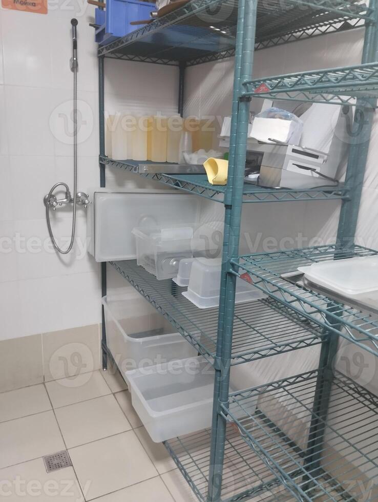 rack for drying equipment in catering, cafe, pizzeria photo