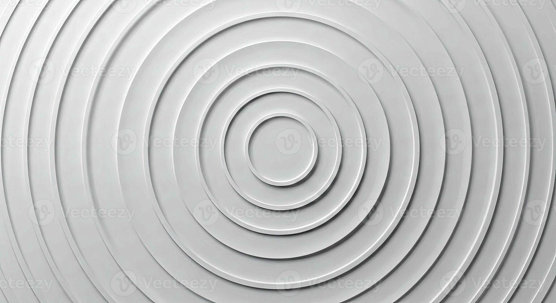 A white wall with a circular pattern photo