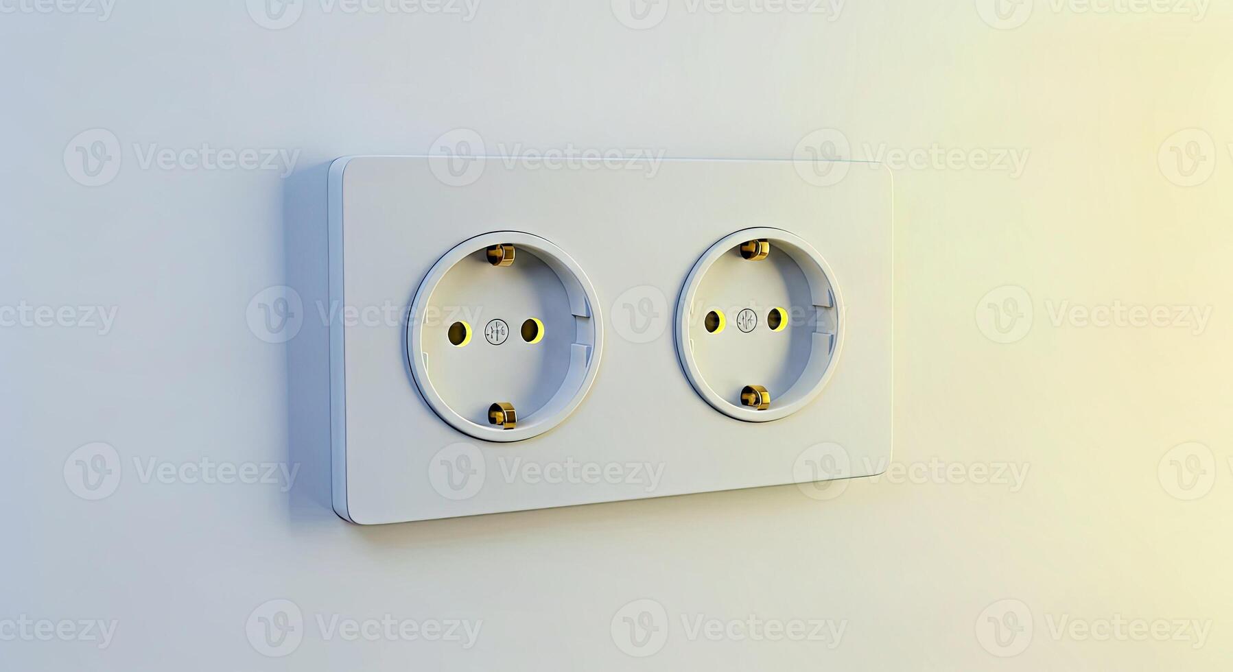 Two sockets on a white wall with a yellow light photo