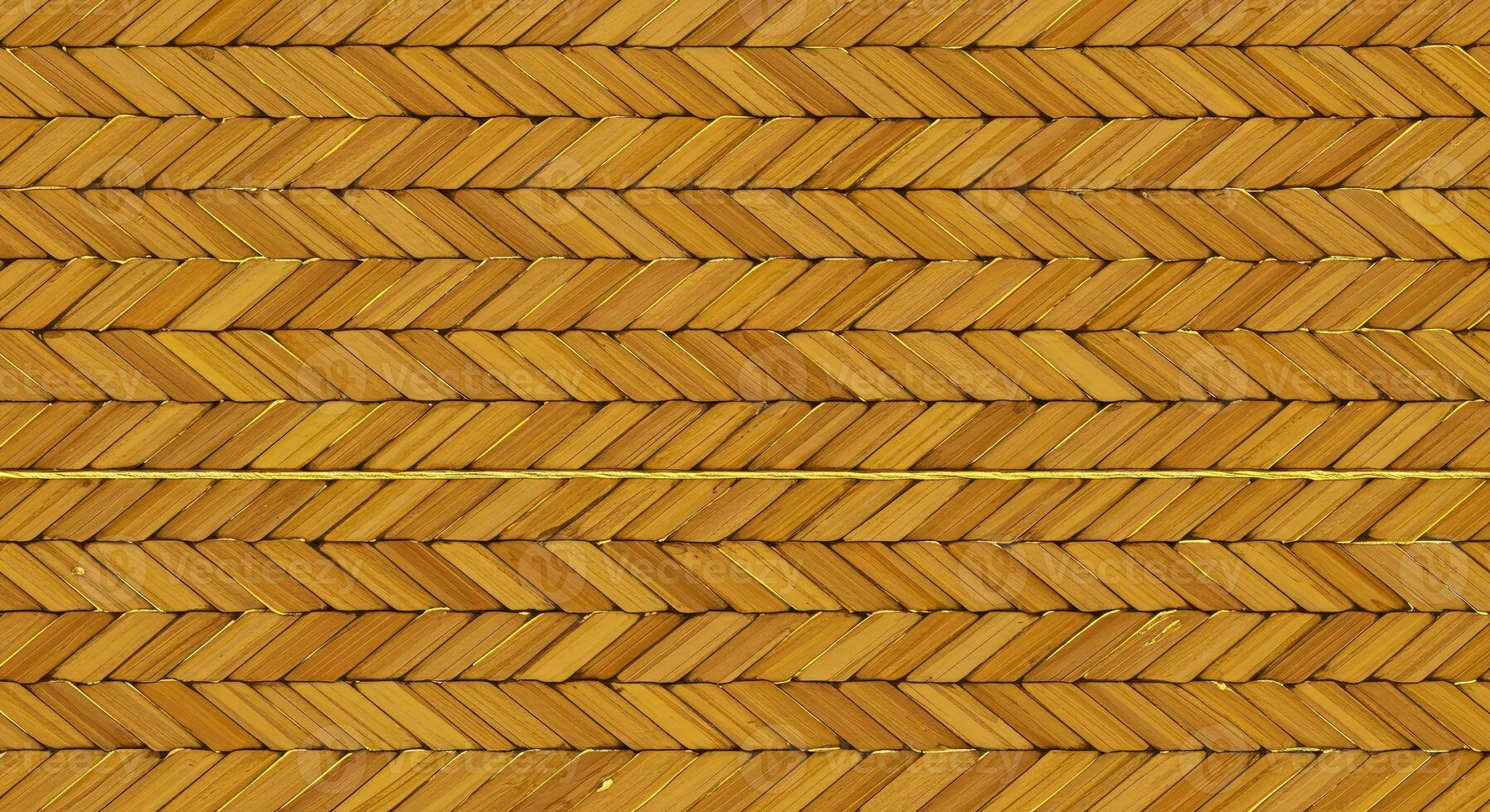 A close up of a woven pattern of yellow and brown photo