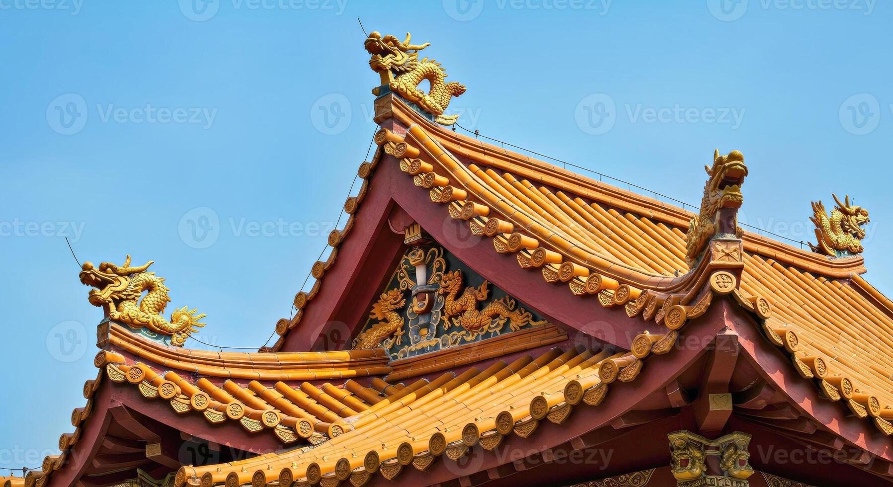 The roof of a chinese building has dragon statues on it photo
