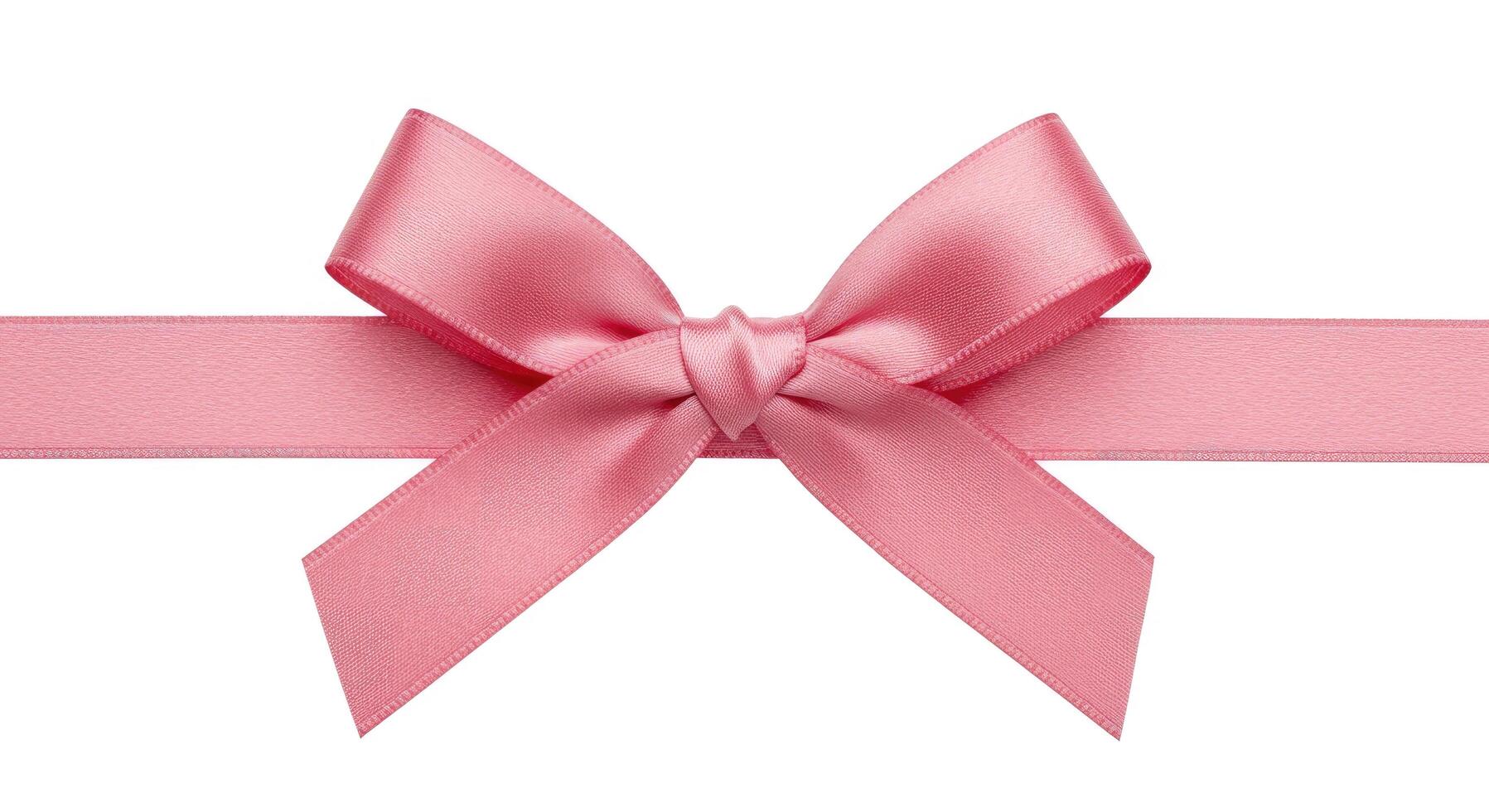 A pink ribbon with a bow on it photo