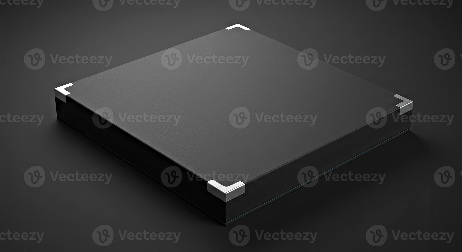 A black box with a silver frame on a black background photo