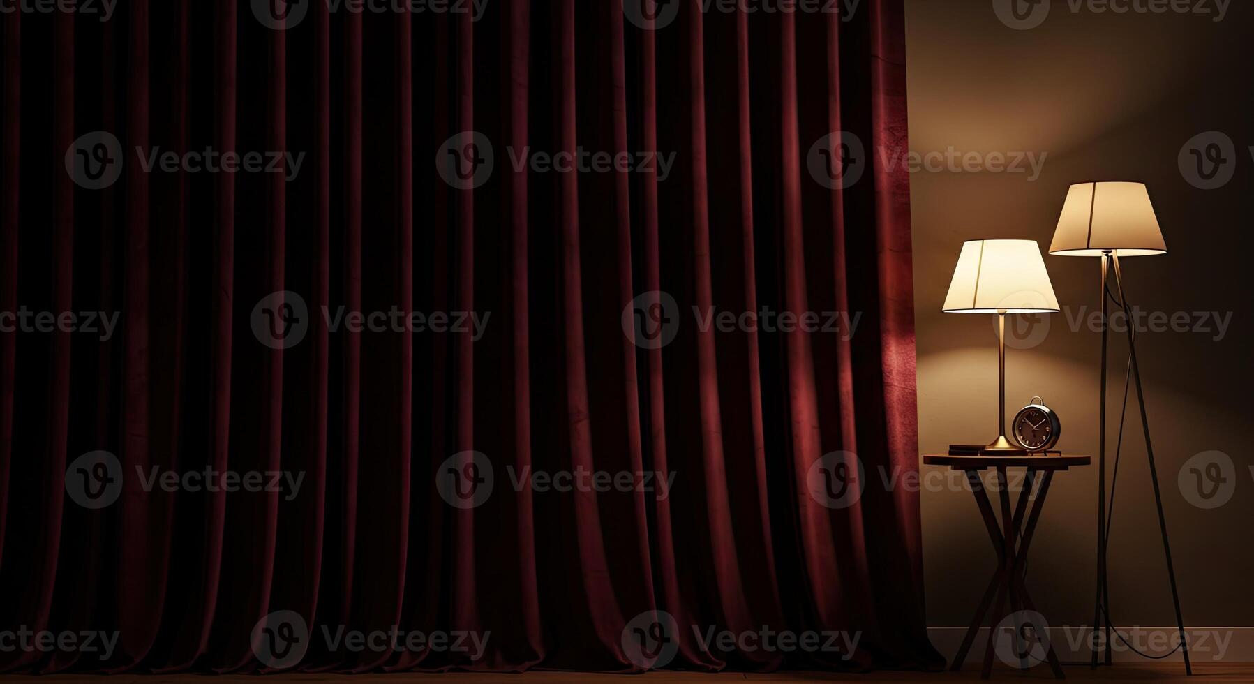 A red curtain and lamp in front of a dark room photo