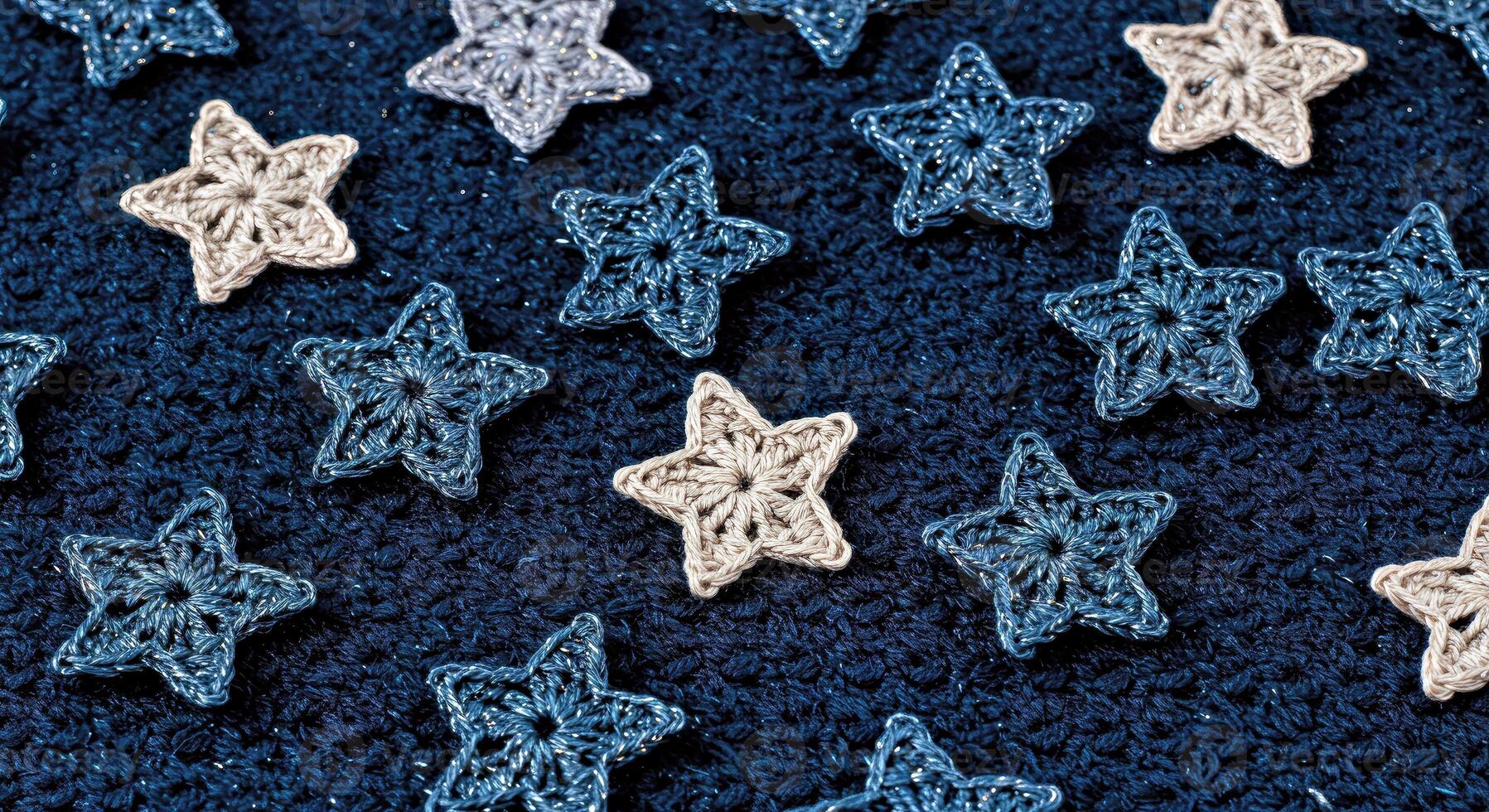 Crochet stars on blue background photo