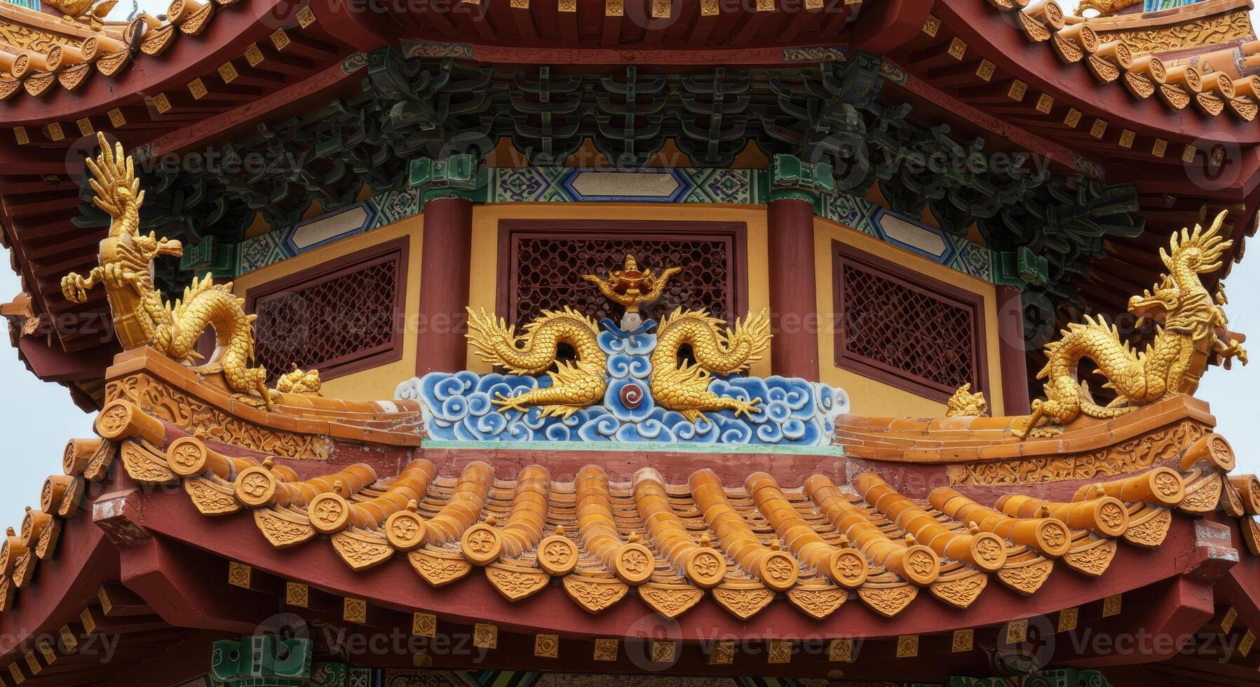 A chinese pagoda with dragon statues on top photo