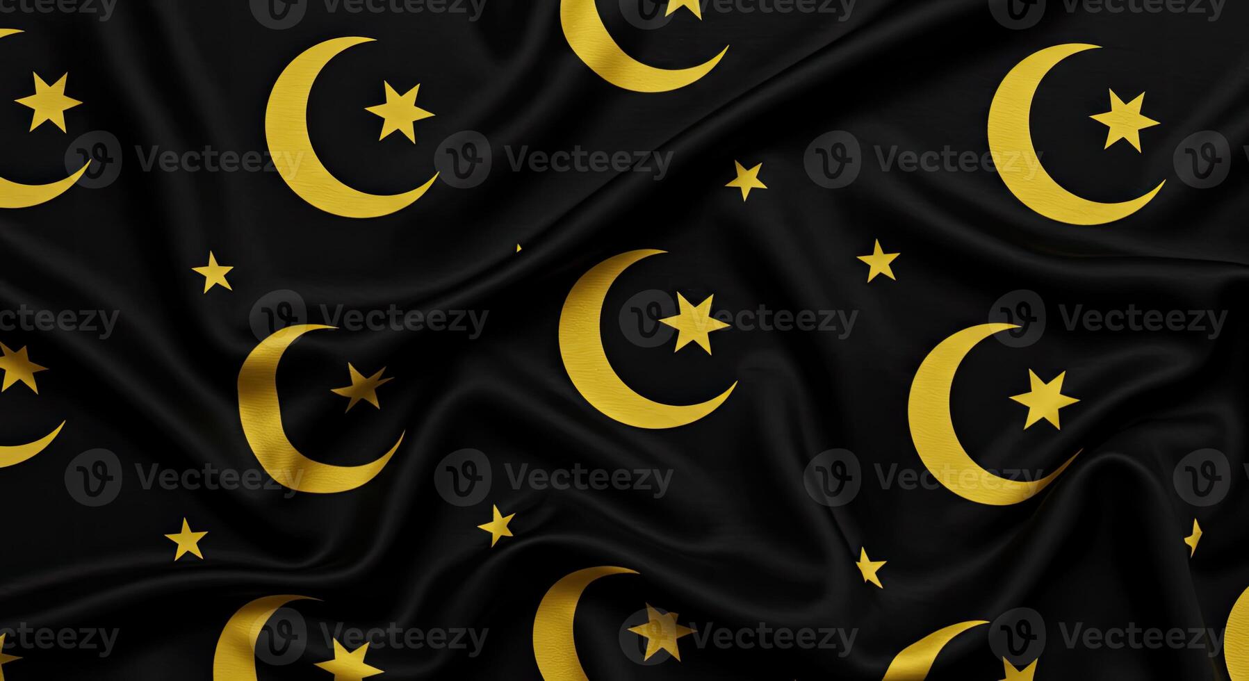 A black and gold fabric with stars and crescents photo