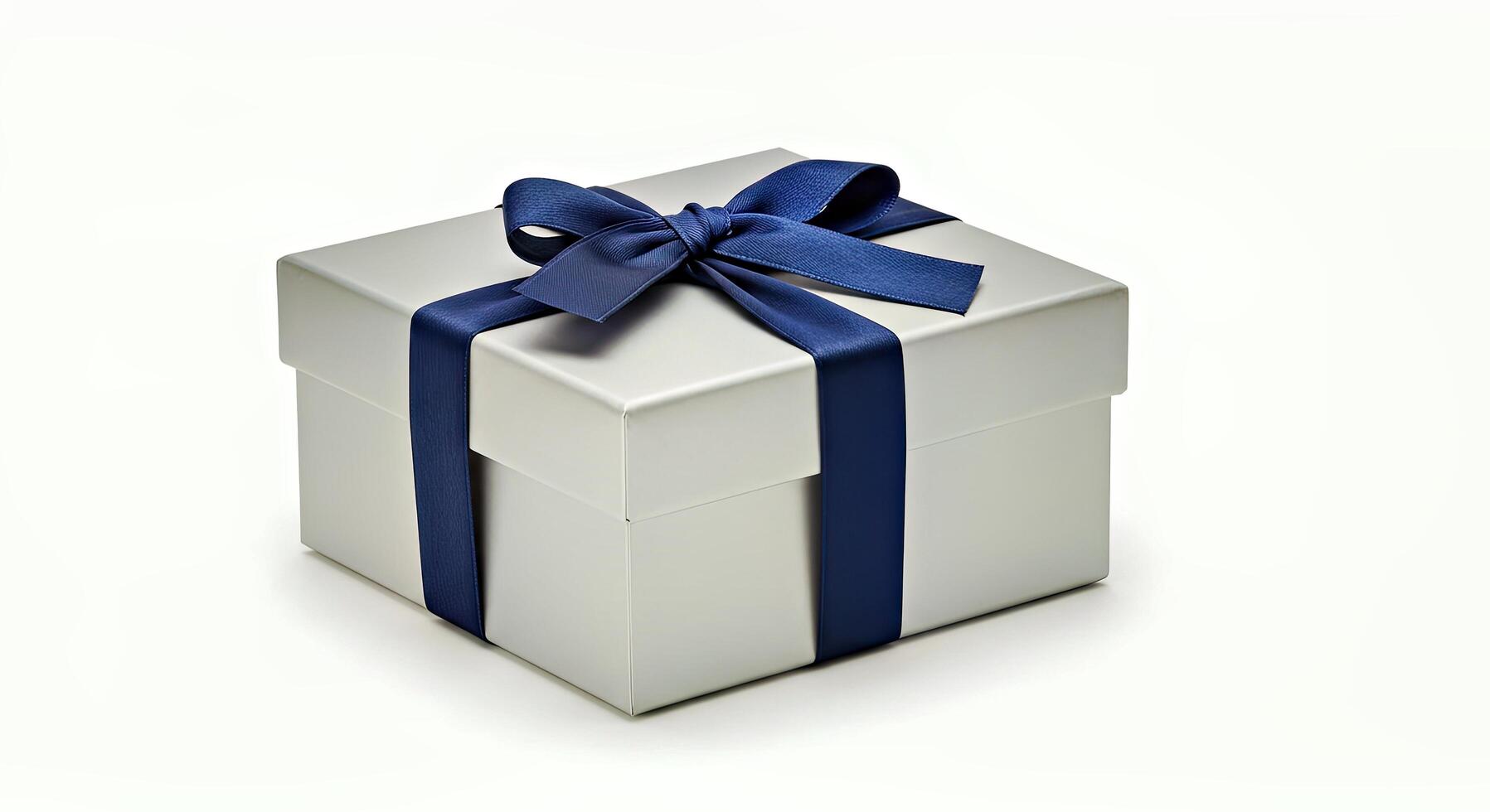 Silver gift box with blue ribbon on white background photo