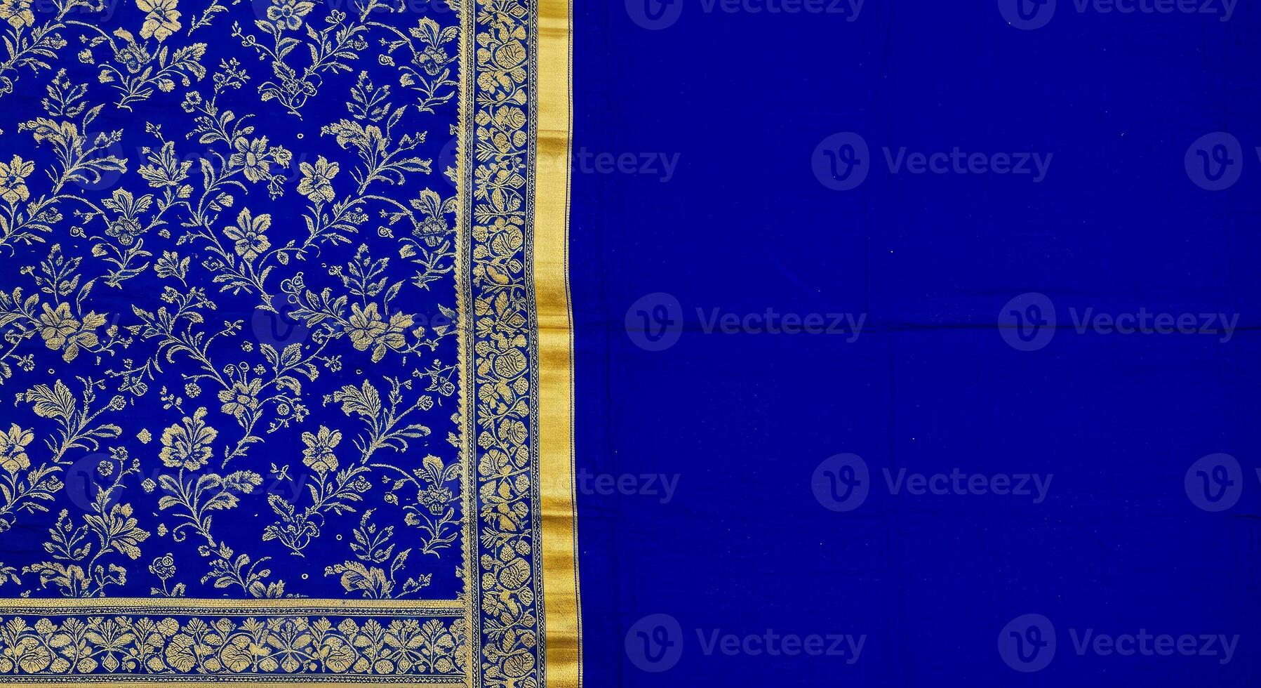 Blue and gold silk sari with floral motifs photo