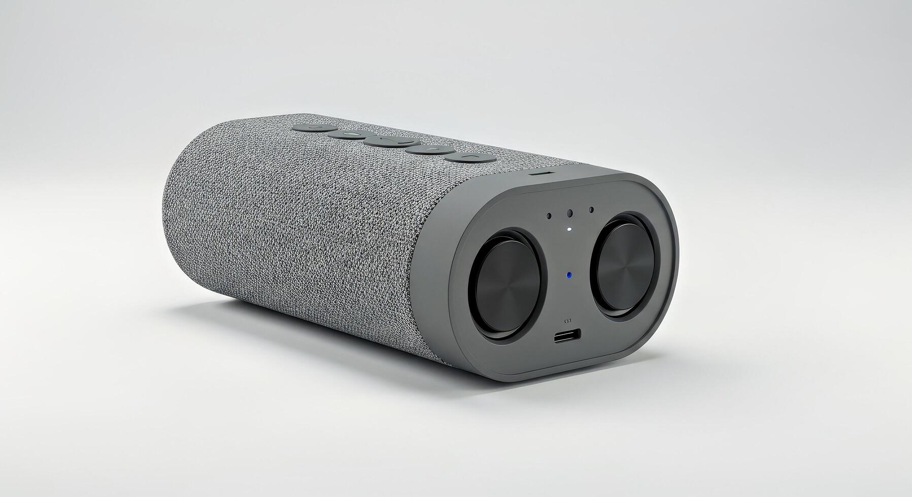 A grey speaker with a blue light on it photo