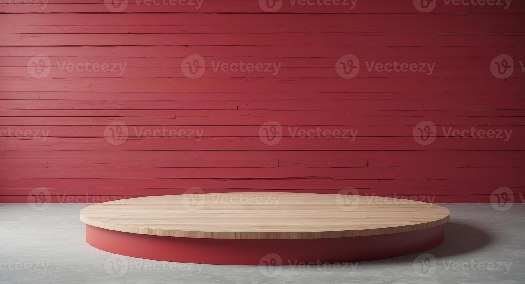 Round wooden table in front of red wall photo