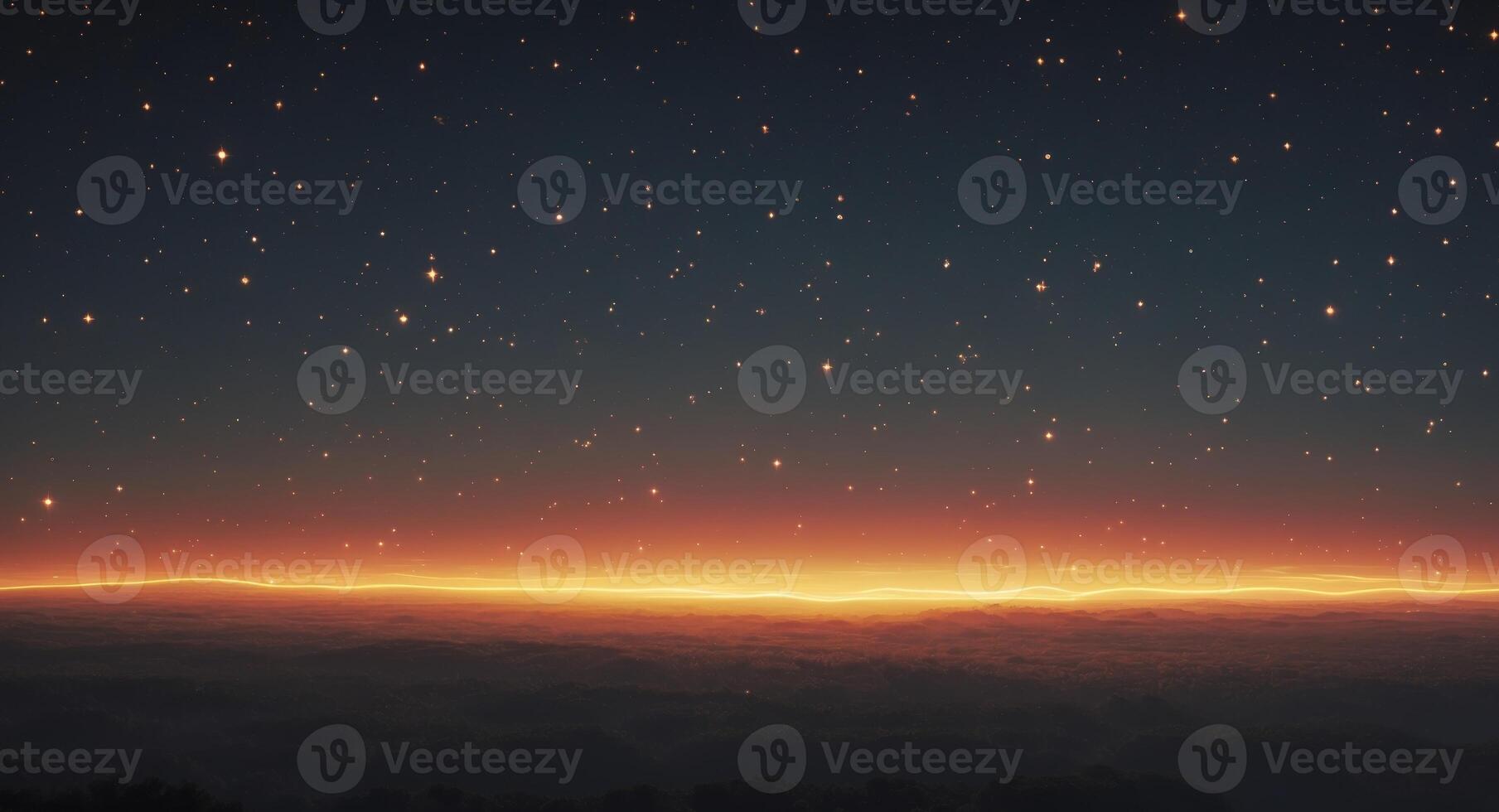 A beautiful sunset over the mountains with stars photo