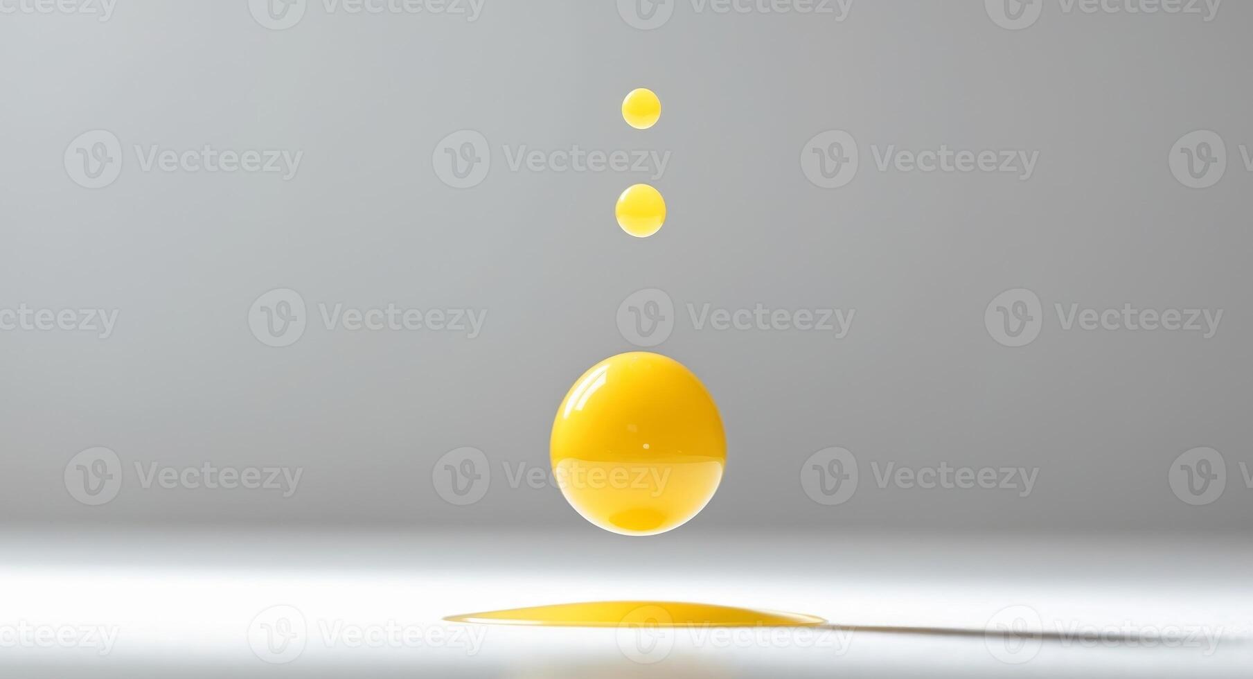 An egg is being dropped into a liquid photo